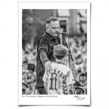 John "The Stickman" Muggianu with David Gogo on stage at Mont Tremblant International Blues Festival